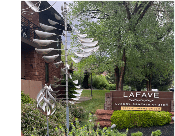 A sign for Lafave Luxury Rentals at Zion. Description generated by AI