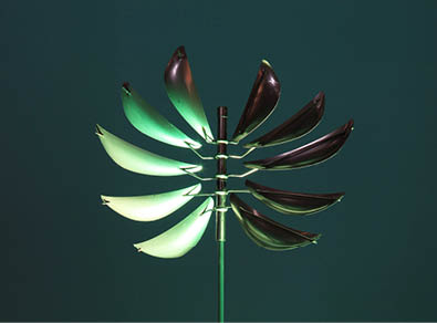 A green and brown fan with a black center. Description generated by AI