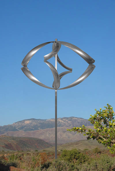 A large metal sculpture of a circle with a smaller circle inside it. Description generated by AI