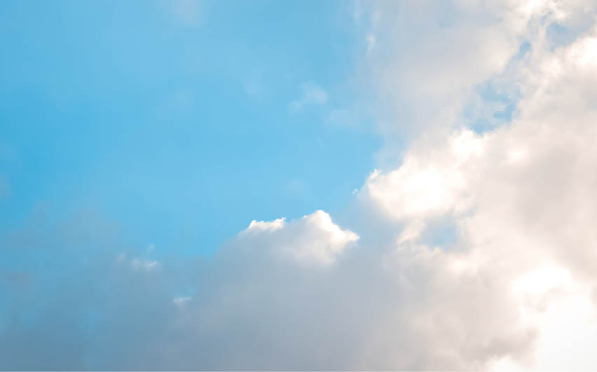 A cloudy blue sky with a few clouds. AI generated content