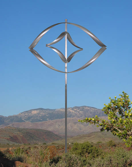A metal sculpture of a circle and a triangle is displayed in a field. AI generated content