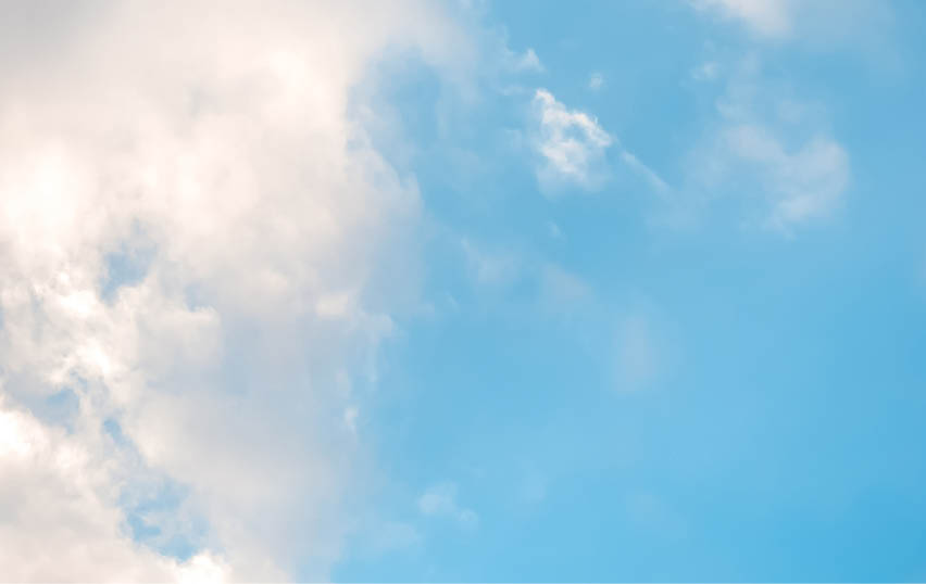 A cloudy blue sky with a few clouds. AI generated content