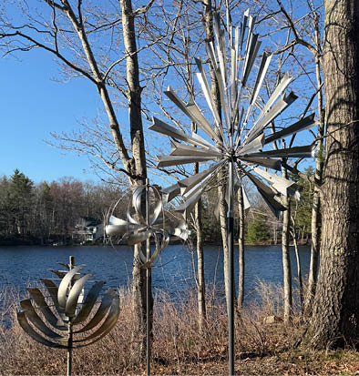 A tree with a blue sky in the background. Description generated by AI